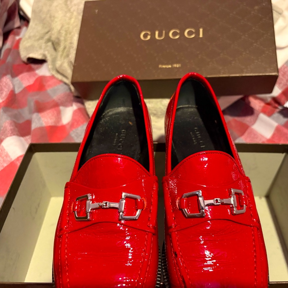 • Red Gucci loafers